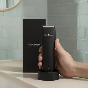 tondeuse noire socle salle de bain main homme